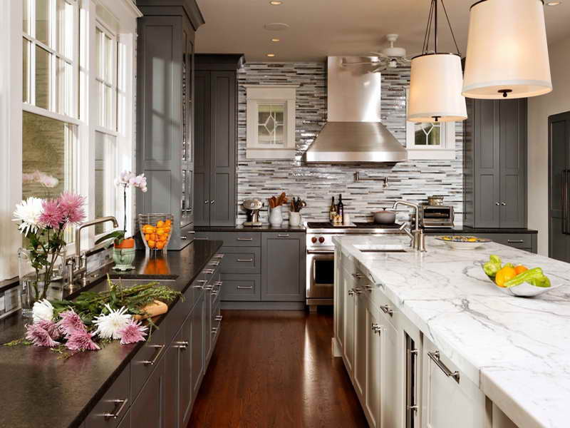dark gray kitchen cabinet with light gray walls