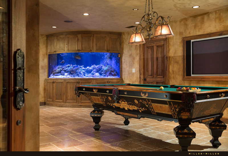 basement 500-gallon reef tank stone floors pool table